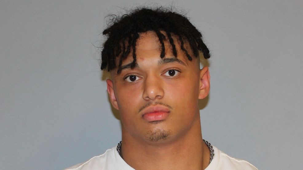 Image for story: Wisconsin college wrestler accused of fatally shooting title-winning school gymnast
