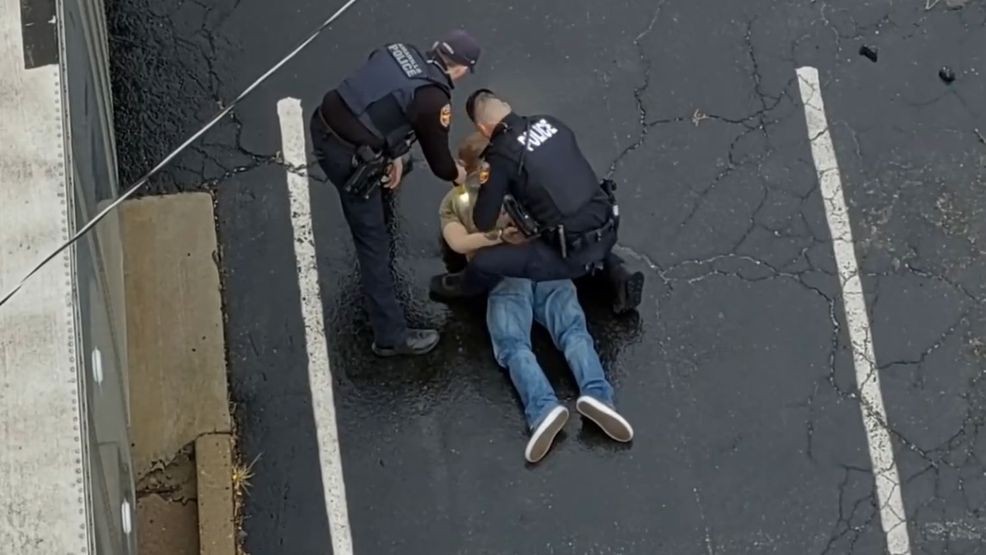 Image for story: Police drone captures chase, crash, and capture of man they say lied about being robbed