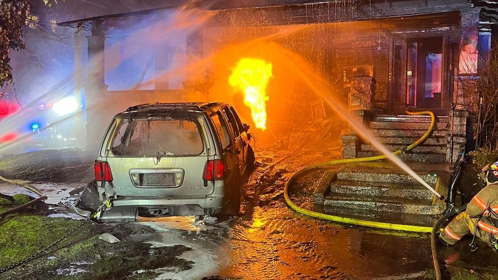 Image for story: Portland driver crashes into home, ignites fire