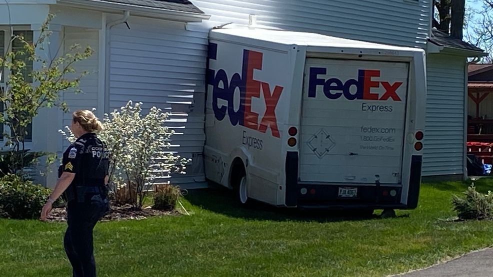 Image for story: FedEx truck plows into northeast Columbus home